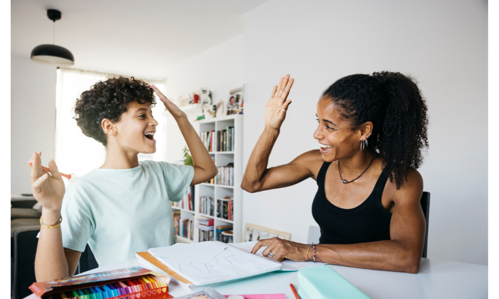 Two student high five